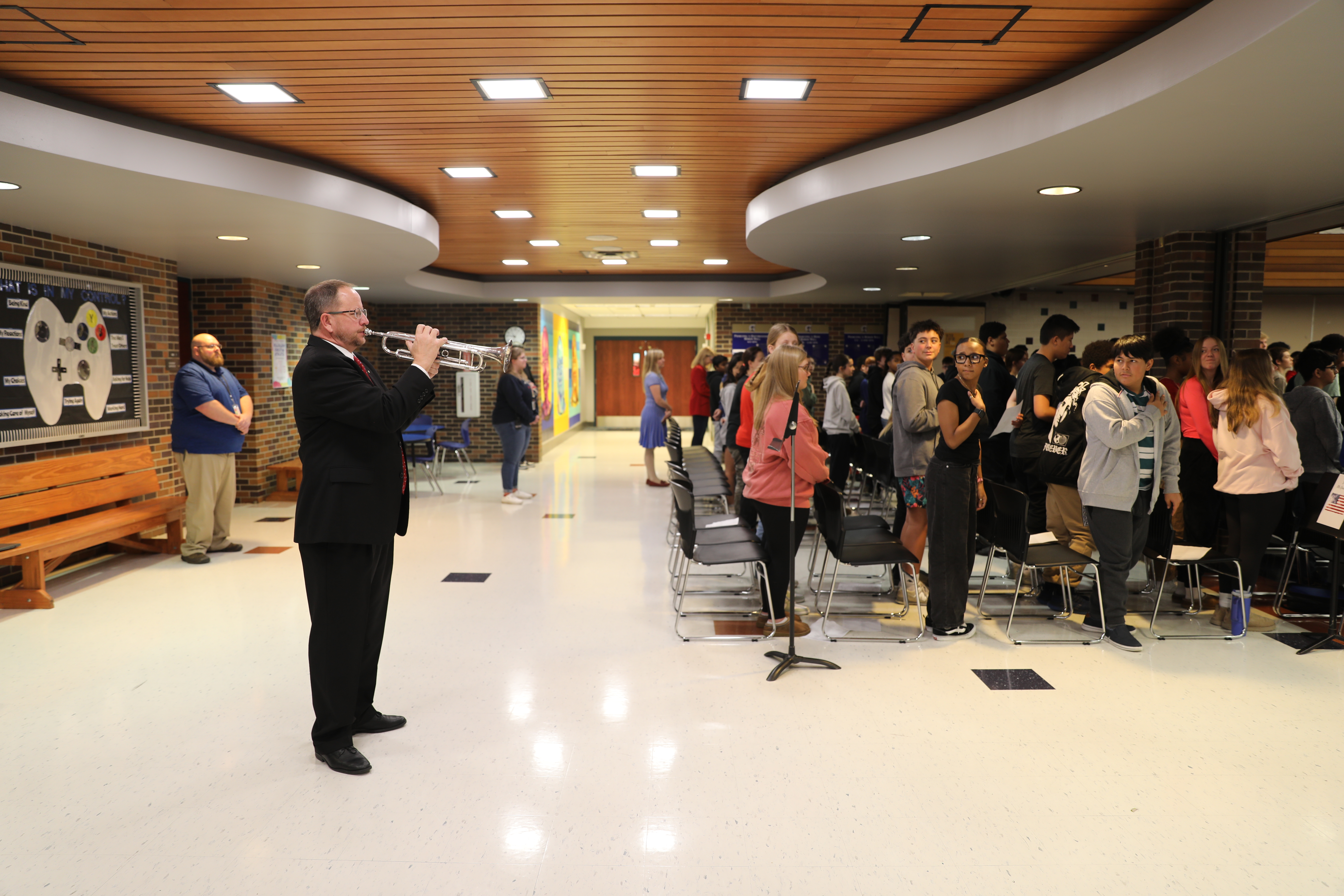 Mr. Jeff Carnall playing "Taps" concluding the program