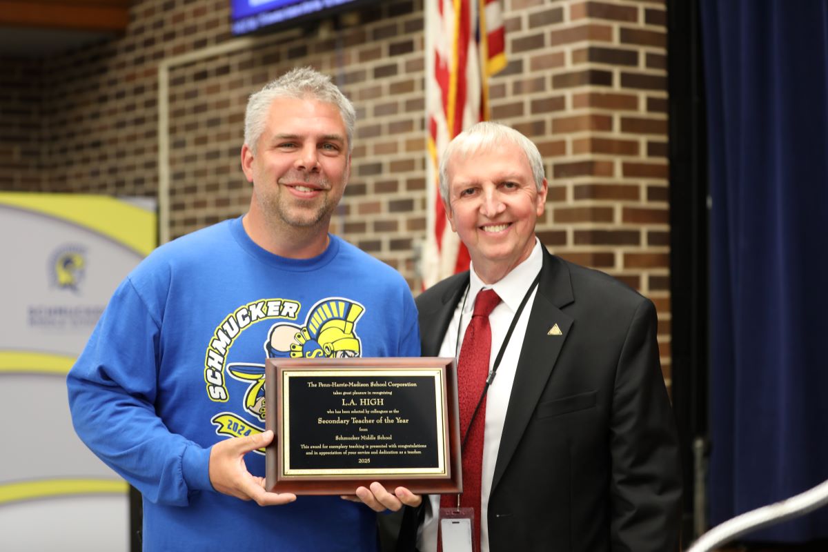 Mr. L.A. High  Receives his PHM Secondary Teacher of the Year Plaque