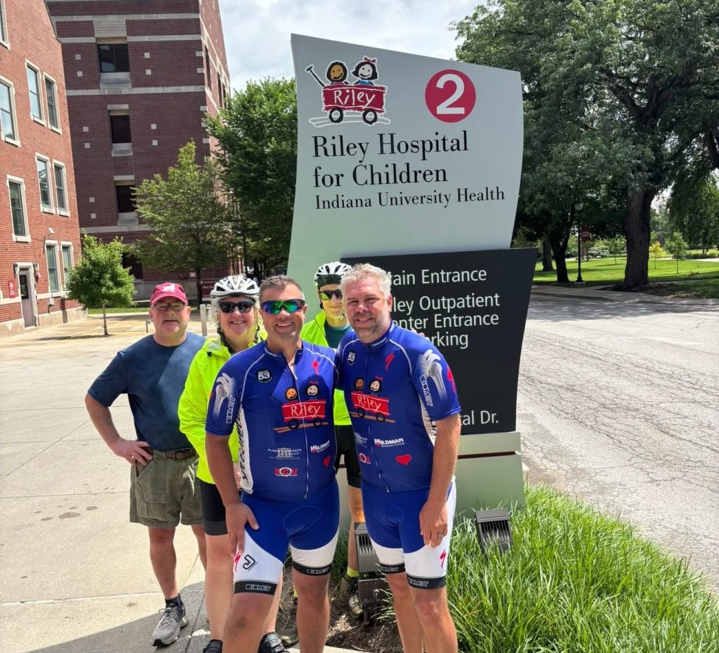 Schmucker Middle School Staff Bike 153 Miles to Deliver Riley Hospital Donation Check